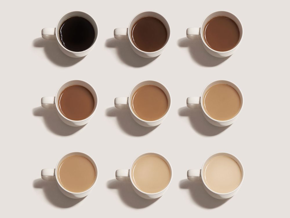 9 coffee cups with various shades of coffee